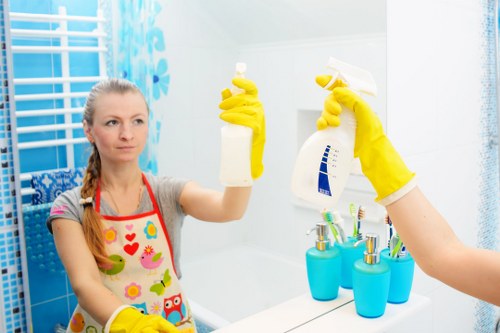 Carpet cleaner preparing a transparent price quote in a Becontree home