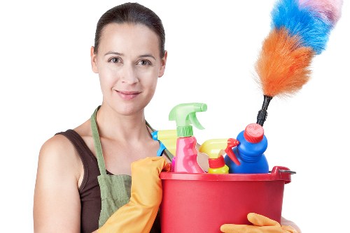 Professional carpet cleaners working on a home carpet in Becontree