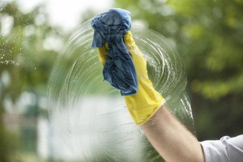Deep cleaning a sofa with specialist equipment in Becontree